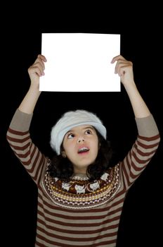 Child surprised at white card that she is holding up







Child looking surprised a