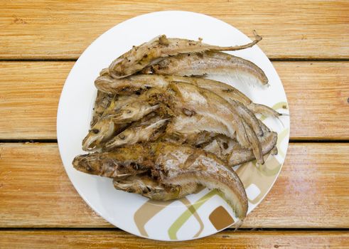 Fried fishes on dish, delicious thai food