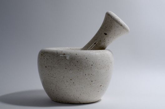 white stone mortar and pestle shoot in studio