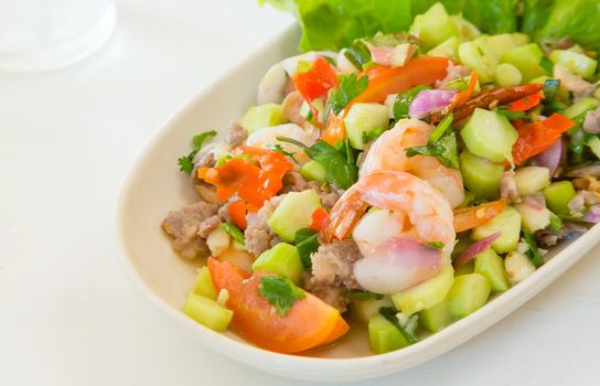 thai food kale with prawn salad on white table