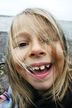 Close up of girl showing her new teeth