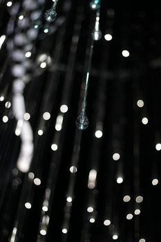 Hanging crystals creating a blurred light with bokeh and bright lights
