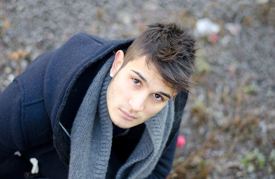 Attractive young man portrait shot from above