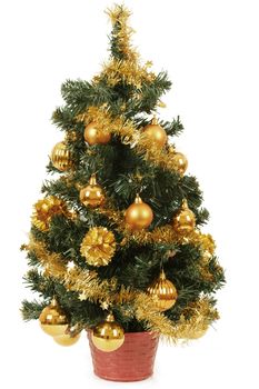small christmas tree in pot with yellow balls on white background
