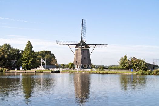 Medieval windmill in the countryside from the Netherlands