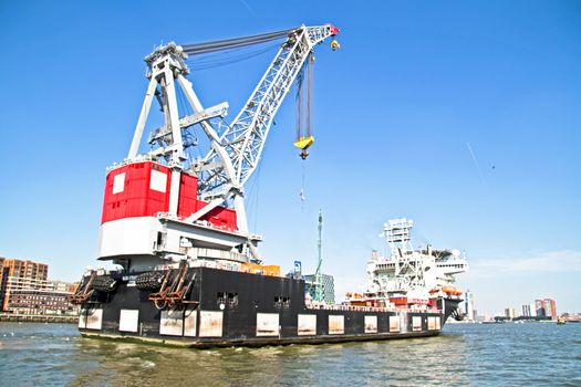 Cargo container ship in Rotterdam harbor in the Netherlands