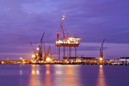 Derrick at night in the harbor from Amsterdam the Netherlands