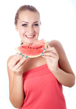 Woman against white background taking a bite of watermelon.