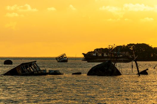 Damaged Boats at Sunrise in San Andres, Colombia