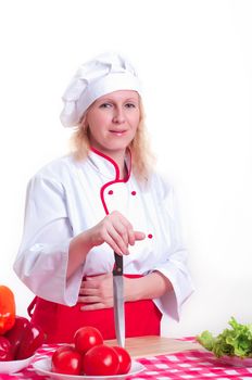 Portrait of attractive cook woman, holding a knife