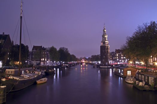 Medieval Montelbaanstower by night  in Amsterdam the Netherlands