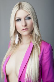 attractive blonde girl in pink jacket