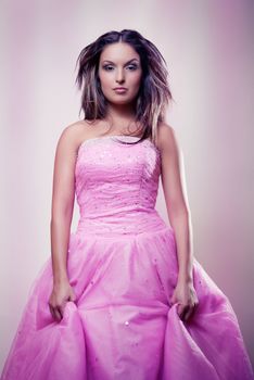 young girl in pink dress