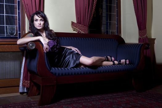 beautiful woman on vintage sofa, luxury interior