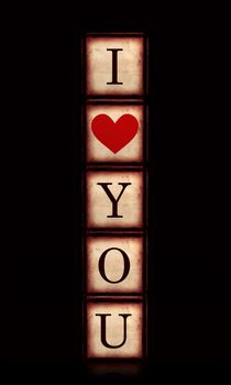 3d wooden cubes over black, letters makes I love you with red heart, retro concept, vertical