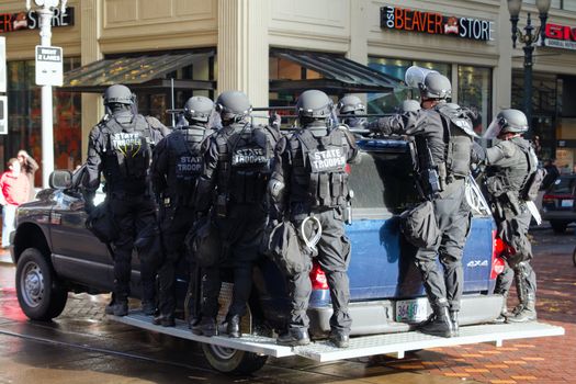 PORTLAND, OREGON - NOV 17: Oregon State Trooper in Riot Gear on Vehicle in Downtown Portland, Oregon during a Occupy Portland protest on the first anniversary of Occupy Wall Street November 17, 2011