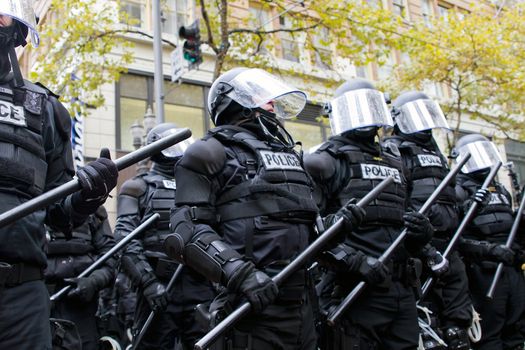 PORTLAND, OREGON - NOV 17: Police in Riot Gear Holding the Line in Downtown Portland, Oregon during a Occupy Portland protest on the first anniversary of Occupy Wall Street November 17, 2011