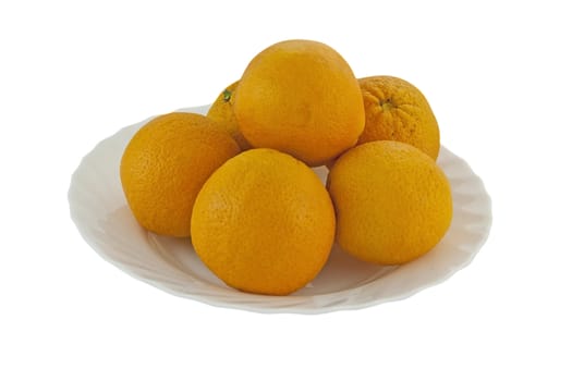 Oranges on a plate isolated on white