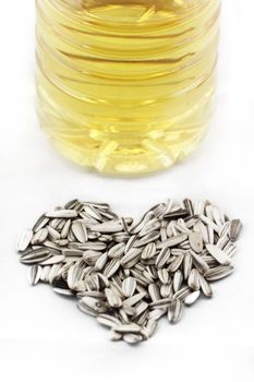 Sunflower seed and oil (white background)