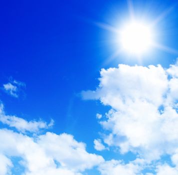 Blue sky with clouds and sun  