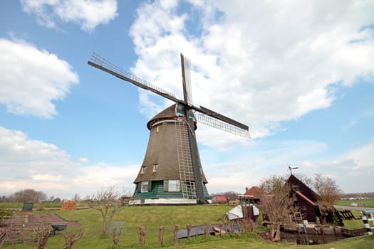 Traditional windmill in the countryside from the Netherlands