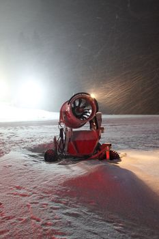 Night shot of artificial snow making machine 