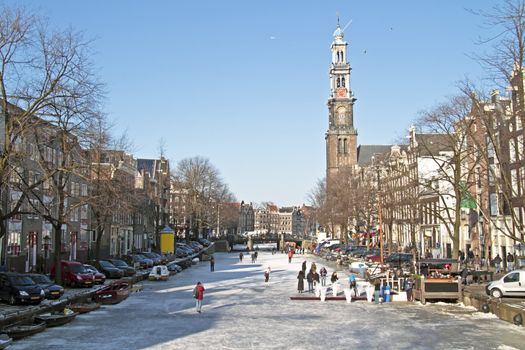 Winter at the Prinsengracht with the Westerkerk in Amsterdam the Netherlands