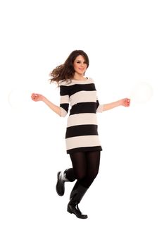 young girl holding balloons isolated on a white background