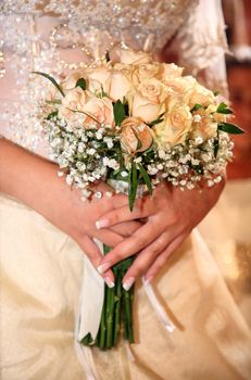 bride holding the wedding bouquet