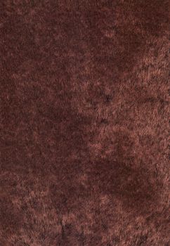 Wool. Background with fluffy brown hair artificially