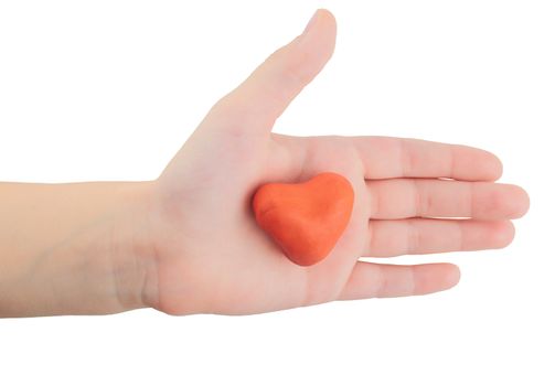 Children's hand with a figure in the form of heart isolated on white background