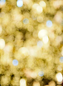 Beautiful vivid defocused christmas background. Major color is gold the other add the Christmas twinkle atmosphere