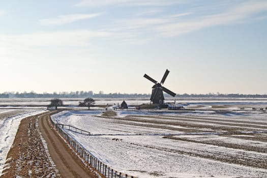 Traditional windmill in the countryside from the Netherlands