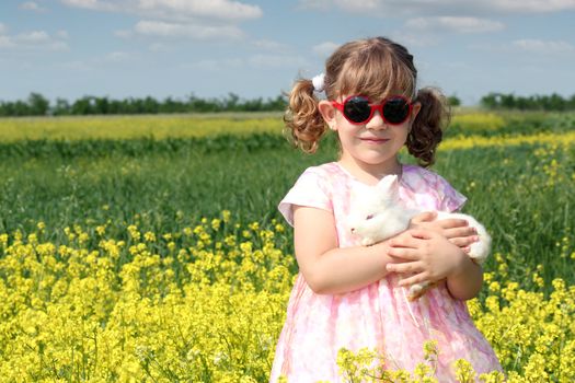 little girl with white rabbit