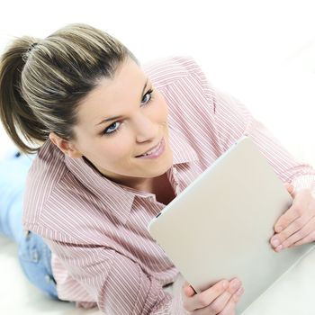 Young woman surfing on his digital tablet