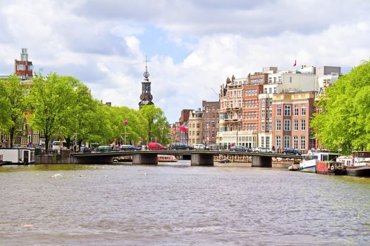 City scenic from Amsterdam with the Munt tower in the Netherlands