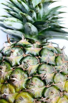 Pineapple close up on white background