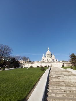 Basilica of the Sacre Coeur in Montmartre Paris under pure blue sky