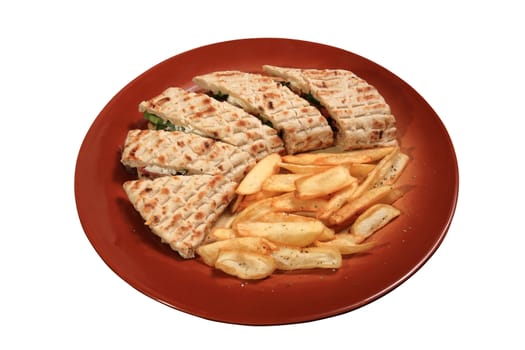 kebab wraped on pita and served on a plate with fries