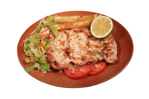 grilled chicken fillet served on a plate with vegetables