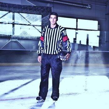 attractive young man - ice hockey referee