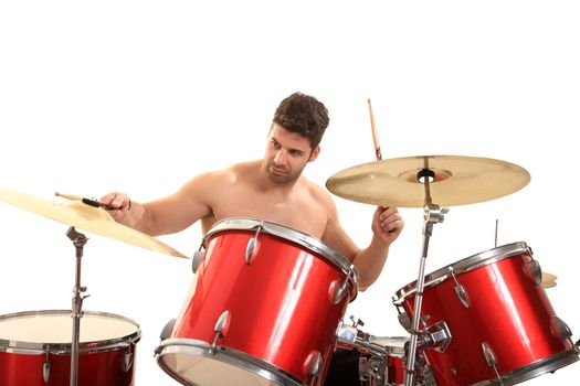 young male drummer isolated on a white background