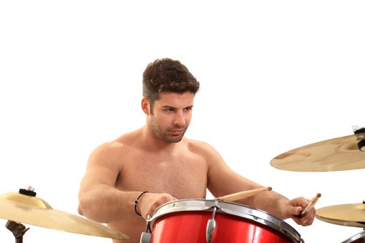 young male drummer isolated on a white background