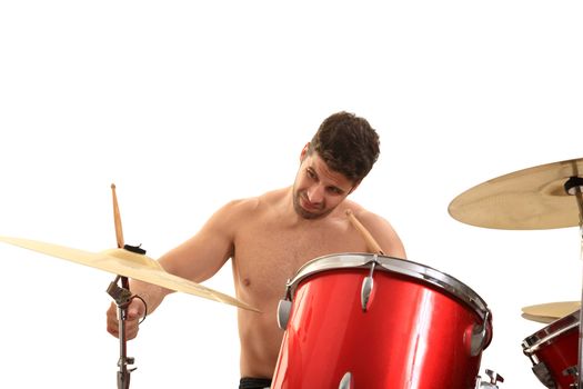 young male drummer isolated on a white background