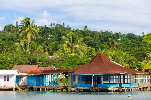 Old buildings on the water in San Andres, Colombia