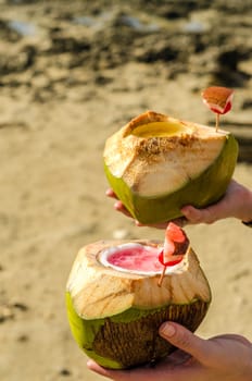 Coconuts containing tropical cocktails in San Andres, Colombia