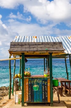 Outdoor bar with drinks in coconuts in San Andres, Colombia