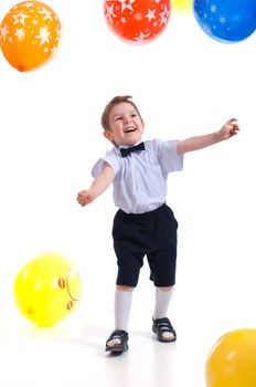 small boy with colorful  air balloon.isolated on white background