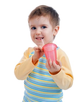 Boy drinking juice isolated on white 