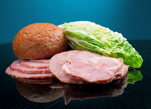 Beautiful sliced food arrangement of meat, bread and vegetables 